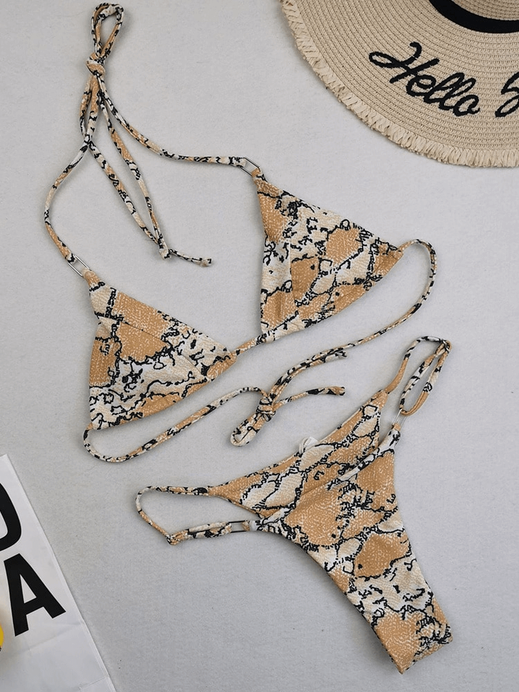 Stylish leopard print low waist bikini set for women, featuring a secure fit and enhanced silhouette. Perfect for beachwear and swimming.